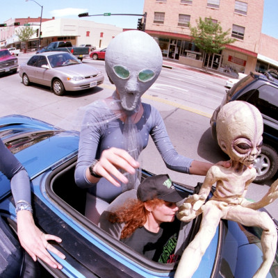 People dressed as aliens