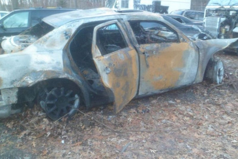 A photo of the wreckage of the burned car that an Oakland County Sheriff's deputy pulled a man from earlier this week 
