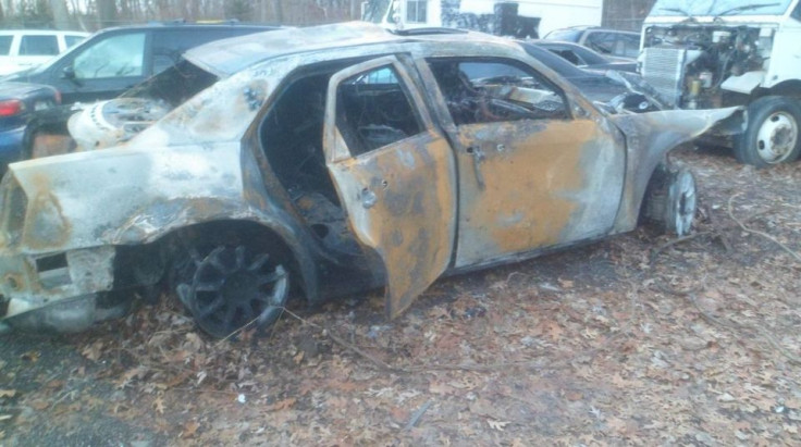 A photo of the wreckage of the burned car that an Oakland County Sheriff's deputy pulled a man from earlier this week 