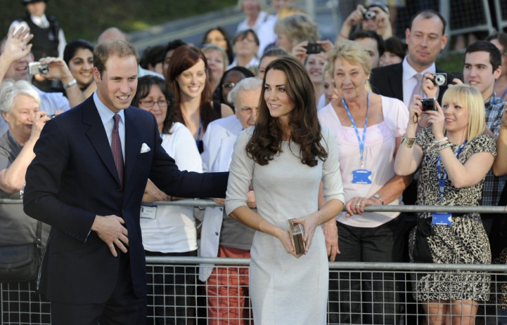 Britain's Prince William and his wife Catherine, Duchess of Cambridge leave after a visit to the Royal Marsden hospital in Sutton, southern England 29/09/2011