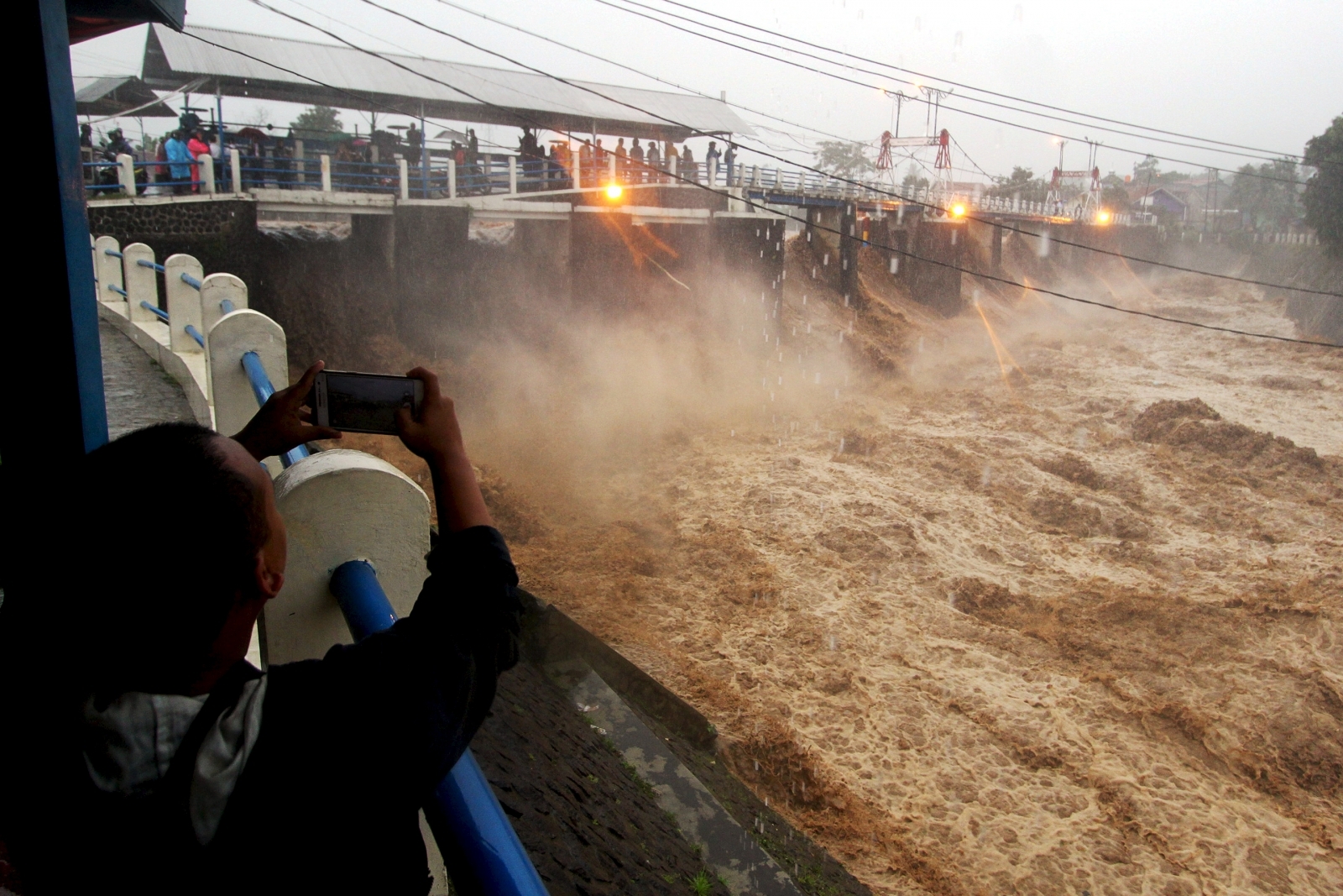 Indonesia Floods In Pictures: Deadly Landslides In Jakarta And West ...