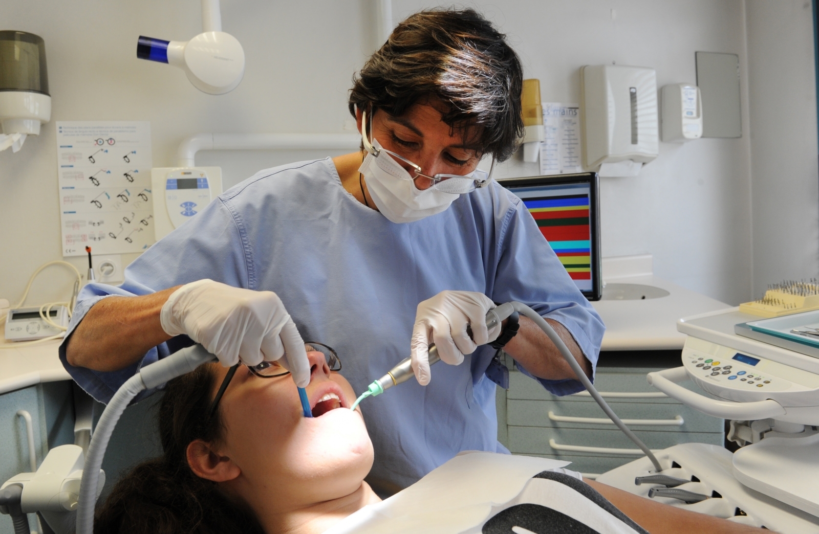A dentist and patient A dentist and patient