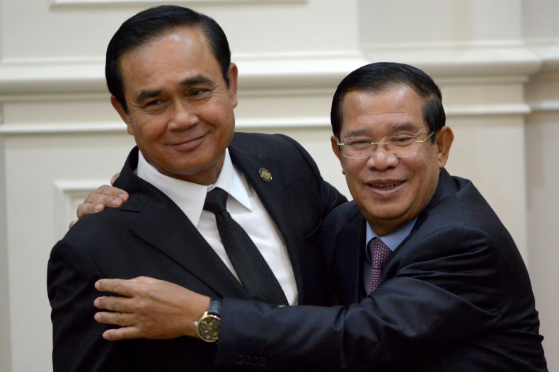 Cambodia's Hun Sen hugs Thailand's Prayut Chan-O-Cha