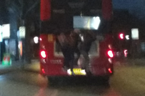 Teens on back of bus
