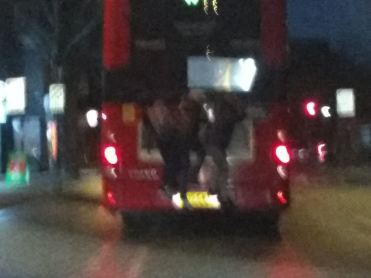 Teens on back of bus