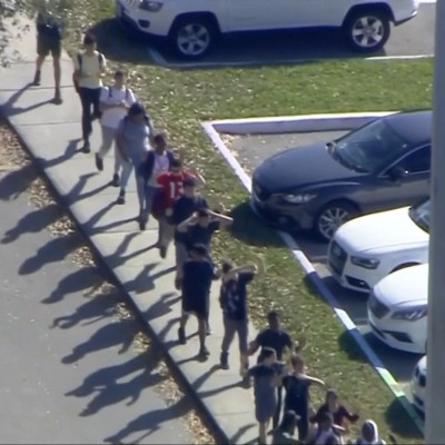 News Footage Shows Kids Walking Out After Florida School Shooting 