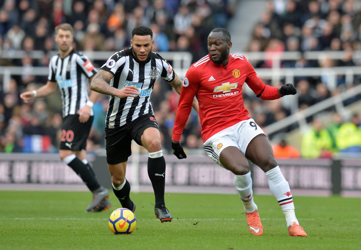 Jamaal Lascelles and Romelu Lukaku