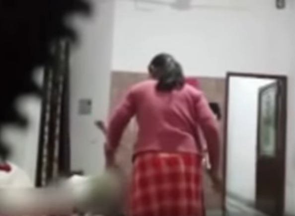 Nanny Caught On Video Hitting & Kicking A Baby Under Her 