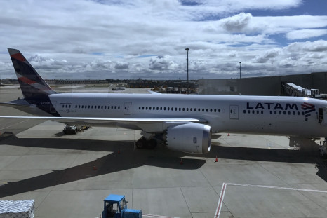 A Latam Airlines airliner sits at the gate at John F. Kennedy International Airport in New York