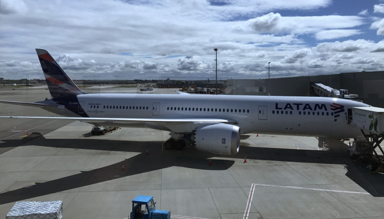 A Latam Airlines airliner sits at the gate at John F. Kennedy International Airport in New York