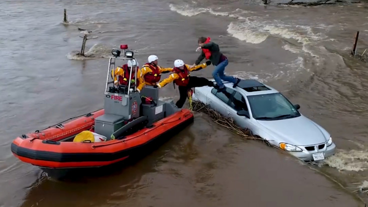 Dramatic Timelapse Shows Motorist Rescued From Car Roof In California Flood