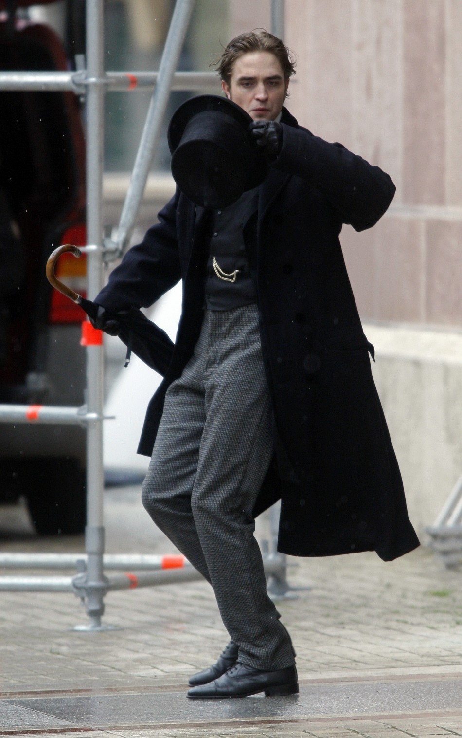 British actor Robert Pattinson is seen during the filming of a scene in his new movie, Bel Ami, in Budapest April 6, 2010.