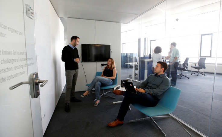 Employees sit together