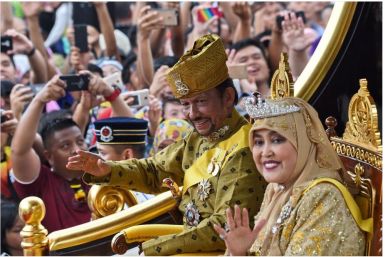 Brunei's Sultan Hassanal Bolkiah and Queen Saleha