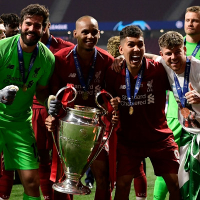Liverpool with Champions League trophy