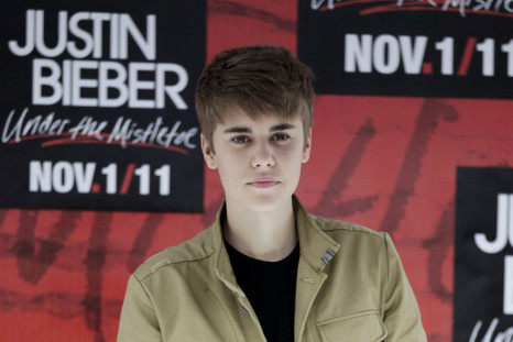 Canadian pop singer Justin Bieber poses during a photocall at the Foro Sol before his &quot;My World Tour&quot; concert in Mexico City