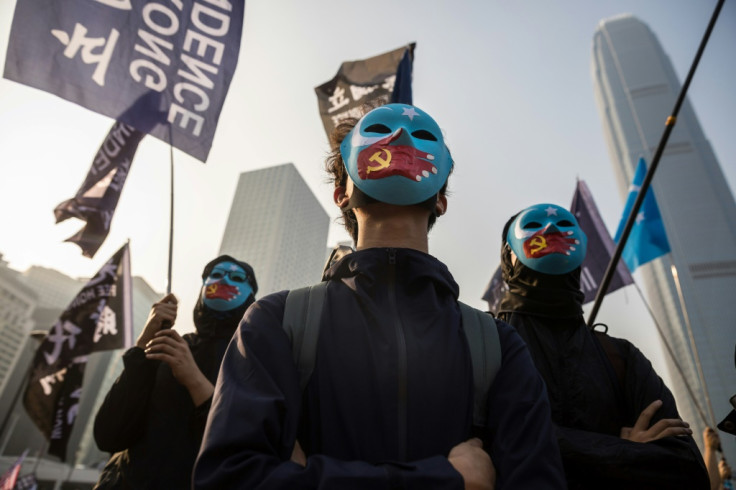 Protesters at a rally for China's Uighurs