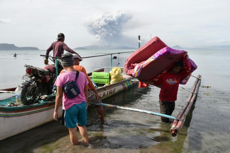 Philippines on alert as volcano spews ash