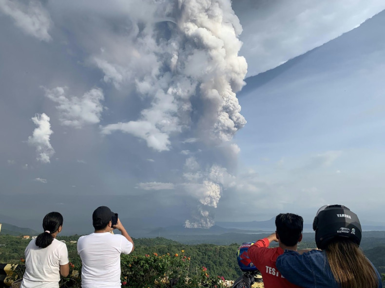 Philippines on alert as volcano spews ash