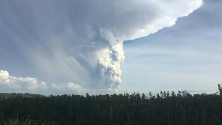 Philippines on alert as volcano spews ash