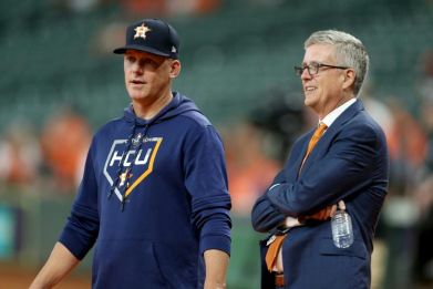 Banned: A.J. Hinch and GM Jeff Luhnow 