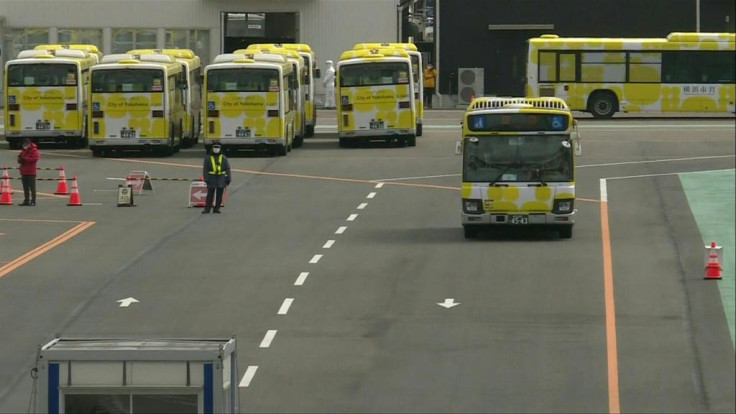 Buses transport Diamond Princess passengers