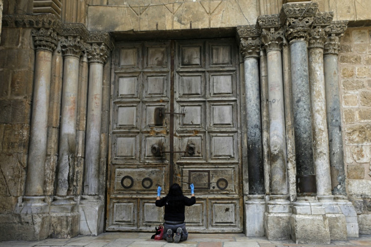 Woman prays in Jerusalem