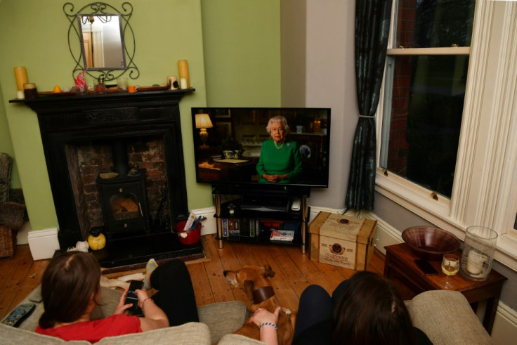 People watching Queen Elizabeth II's address