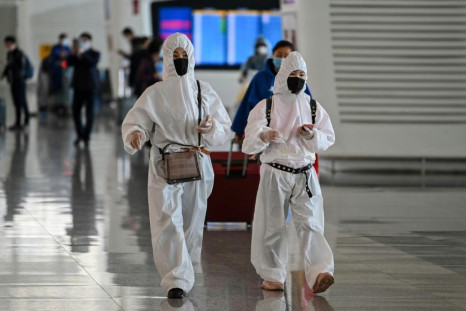 Passengers in protective gear
