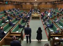 British MPs maintaining social distancing in Parliament
