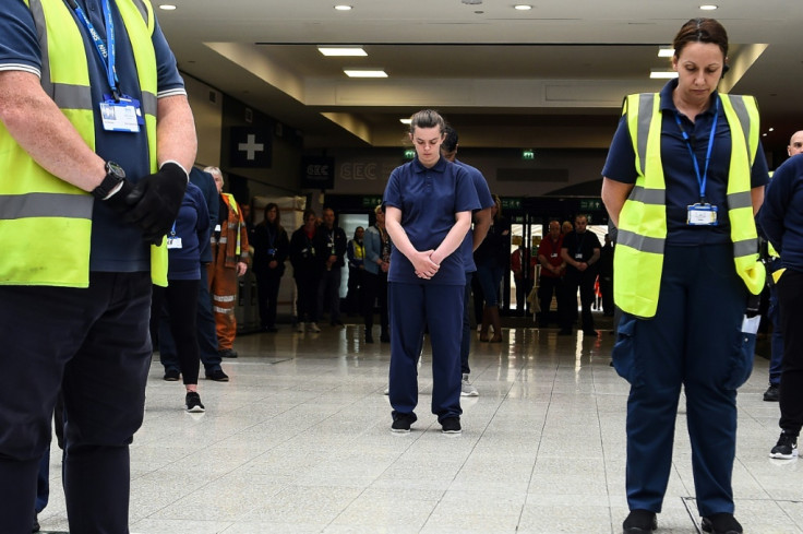 NHS staff observe one-minute silence