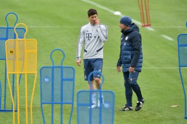 Bayern Munich's headcoach and striker during training