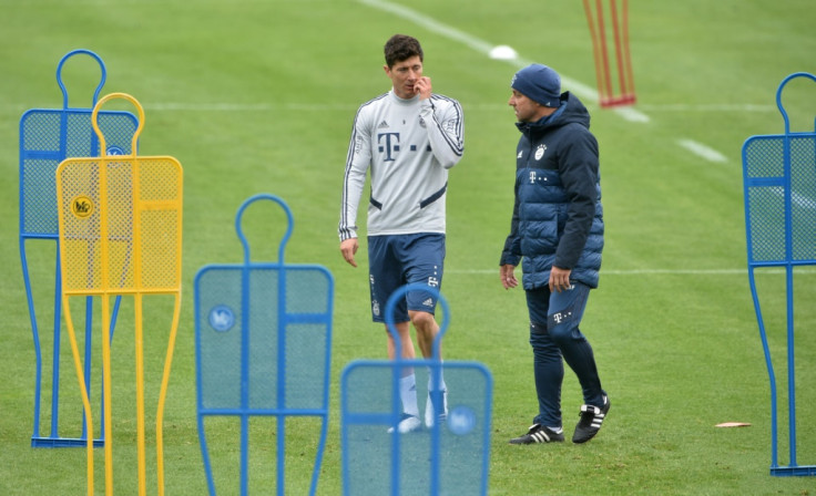 Bayern Munich's headcoach and striker during training