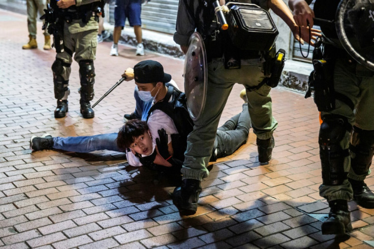A Hong Kong pro-democracy demonstrator is held 