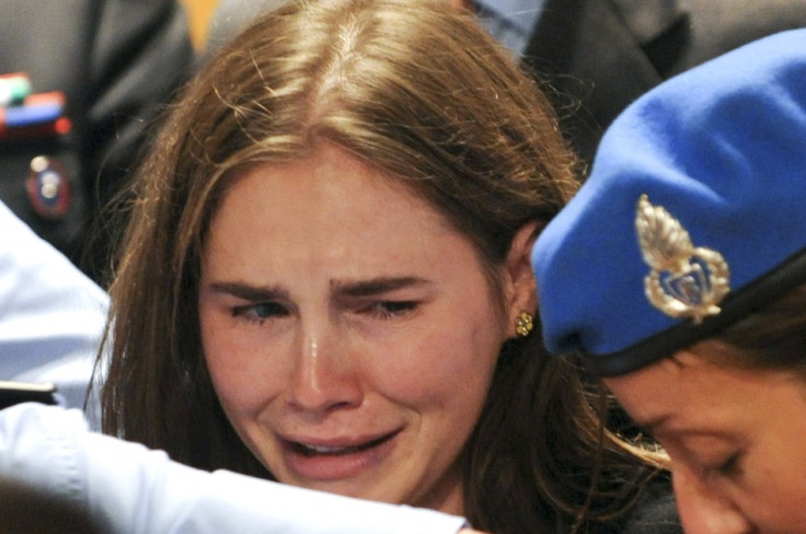 U.S. student Amanda Knox reacts after hearing the verdict during her appeal trial session in Perugia U.S. student Amanda Knox reacts after hearing the verdict during her appeal trial session in Perugia