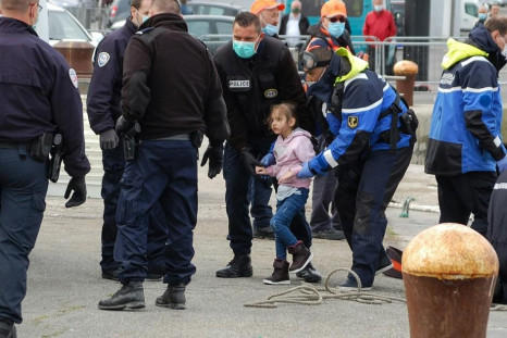 French police with young migrants 
