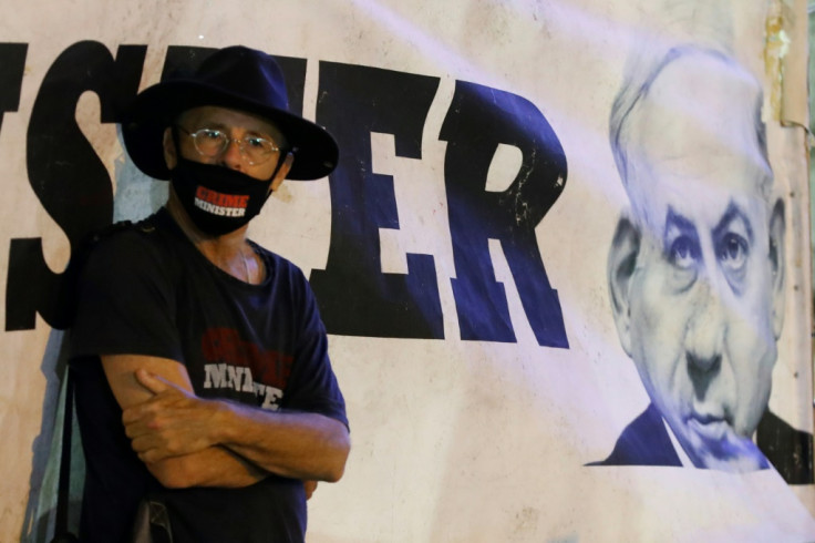 Israeli protester protests against Netanyahu