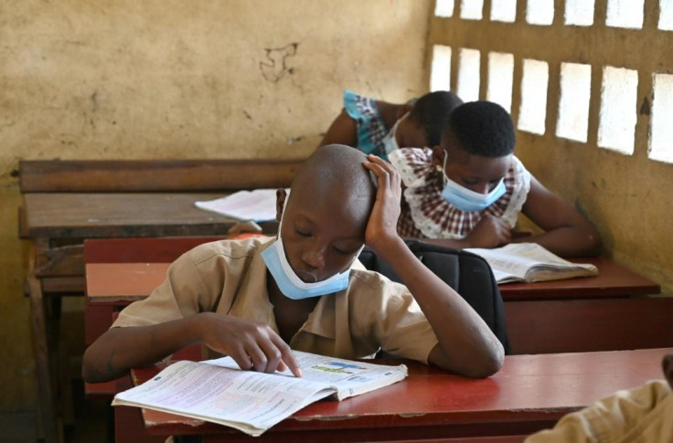 children wearing face masks