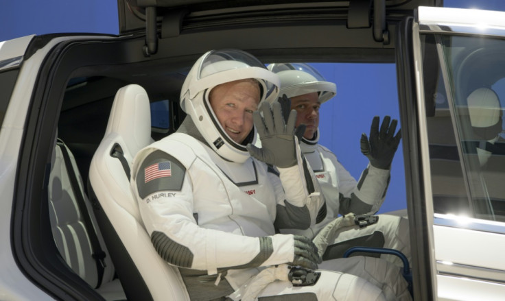 Douglas Hurley and Bob Behnken wearing SpaceX 