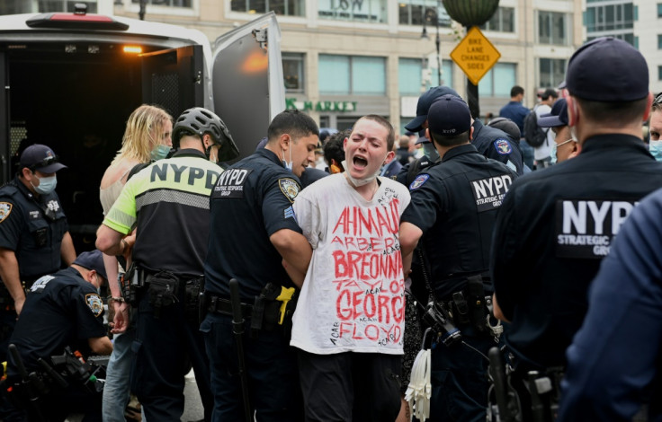 NYPD officers arrest protesters