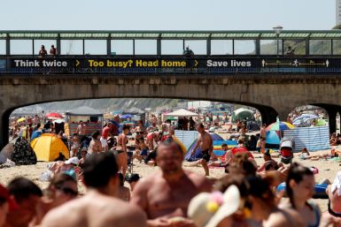 Britons flock beaches and parks