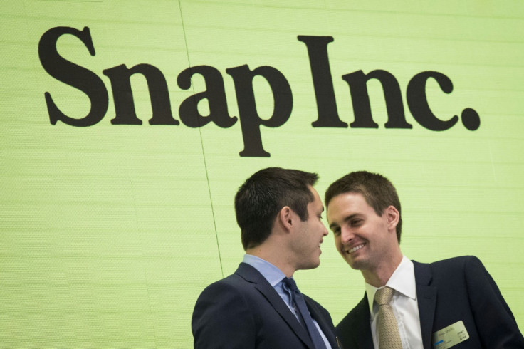 Snap CEO Evan Spiegel (R) seen in a 2017 picture