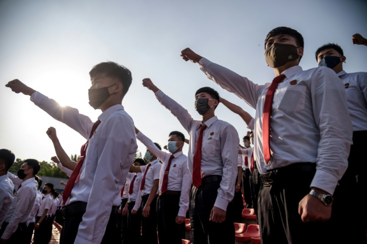 Students and youths attend a mass gathering 