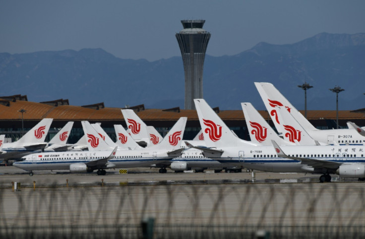 Beijing cancels flights amid virus outbreak