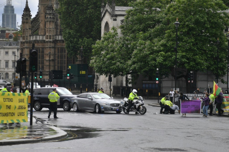 Police detained a protester