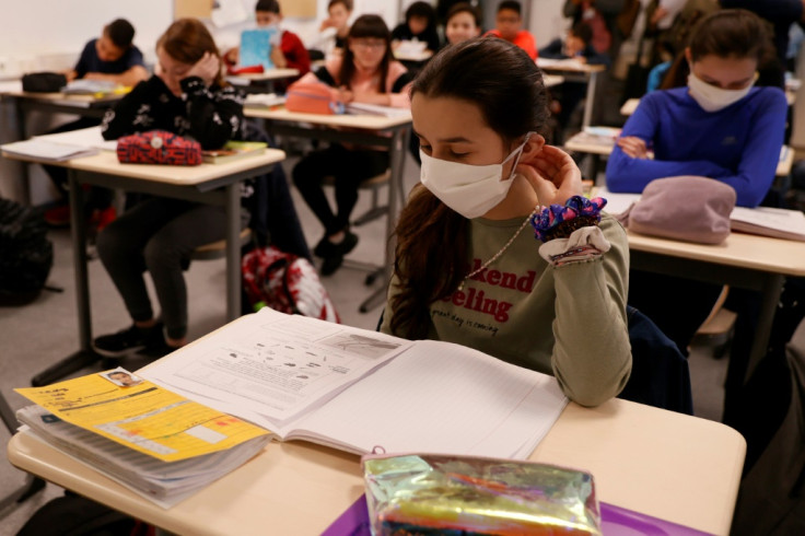 Middle school pupils return to class