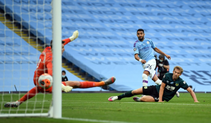 Riyah Mahrez (centre) scores his first goal