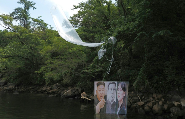 Banner of Kim, his father and sister