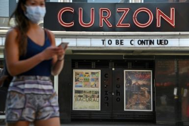 Britain allows cinemas, pubs to reopen