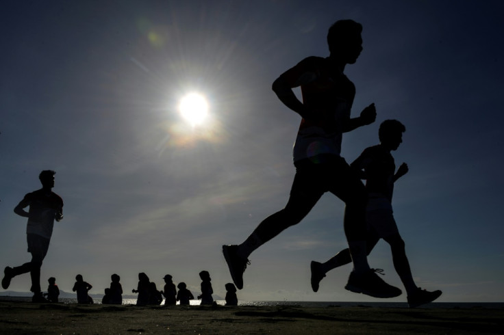 Rugby players train on beach in Indonesia